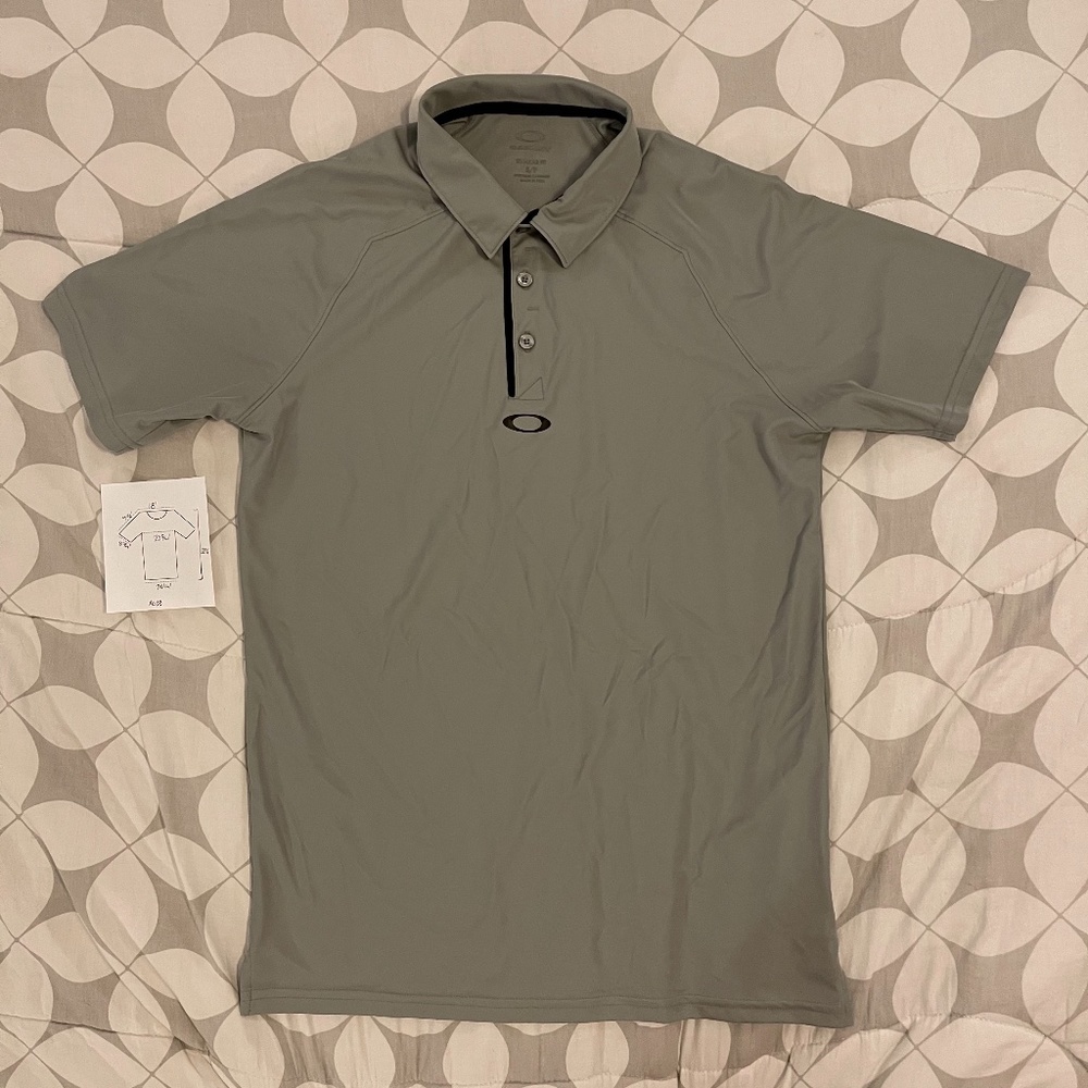 Oakley golf polo shirt. Hydrolix dri-fit fabric.